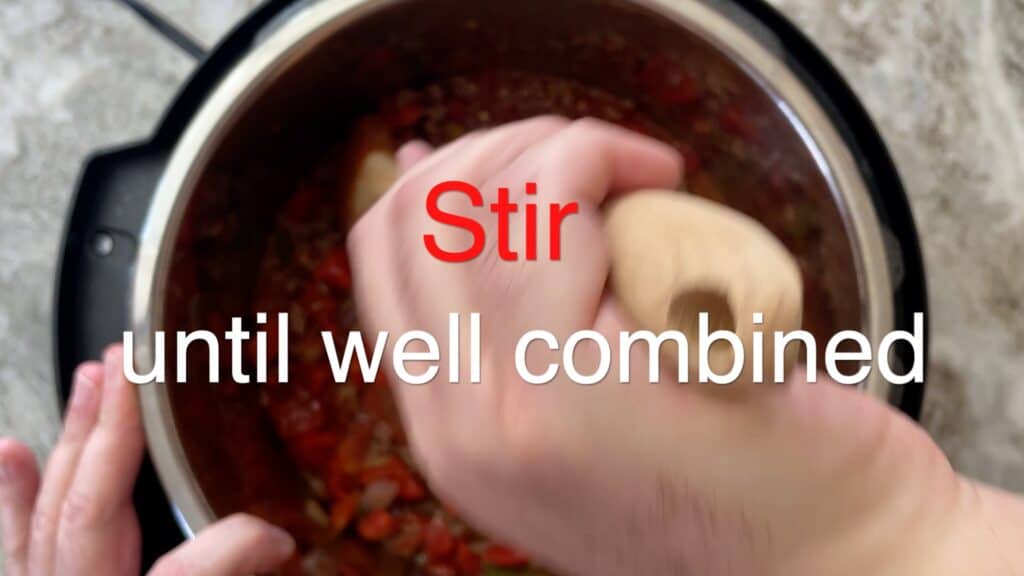 Instant Pot Chili stirring the chili
