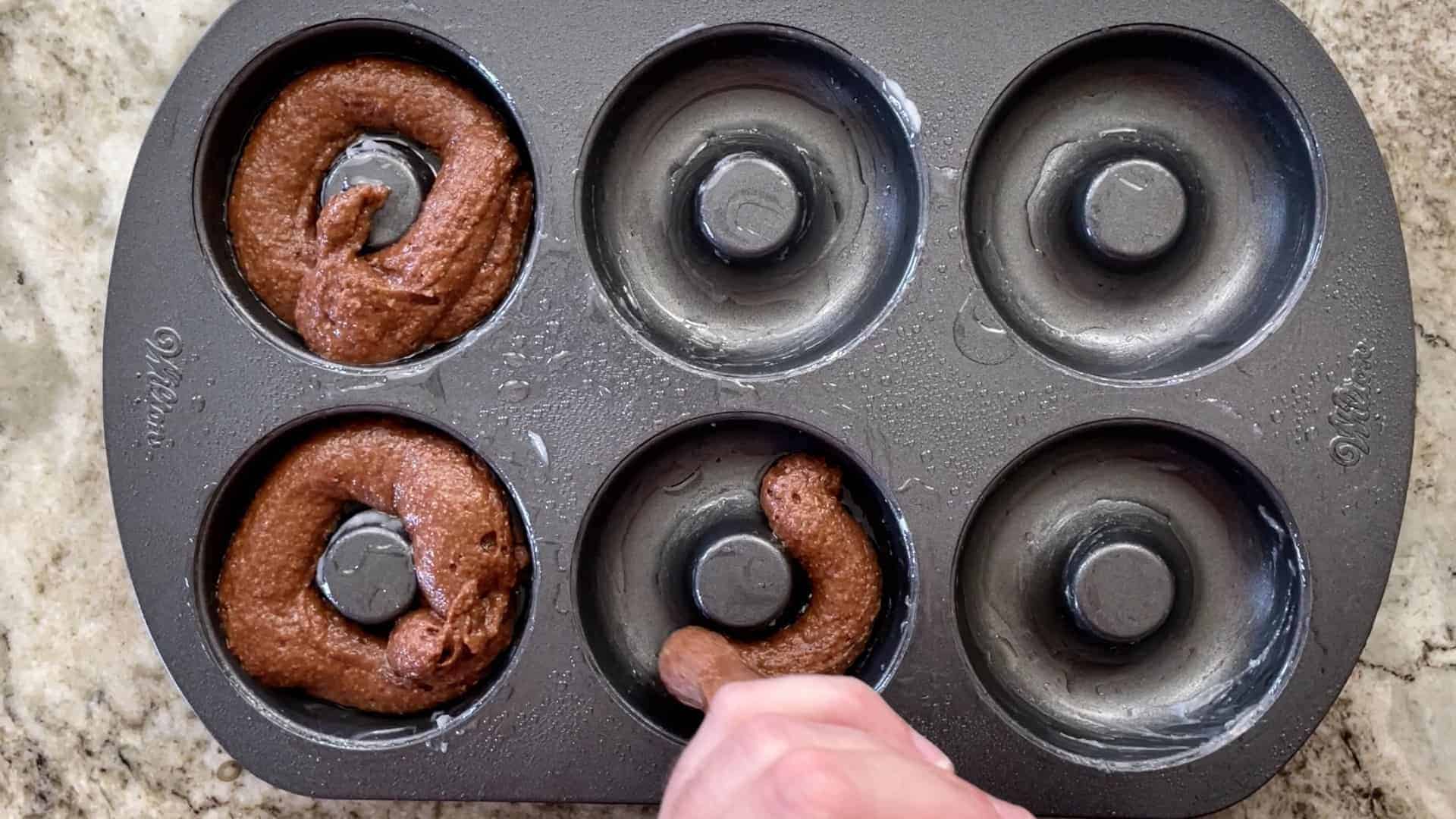 Pip batter into doughnut pan