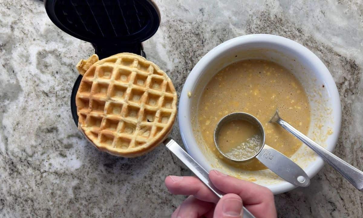 removing a waffle from the waffle iron.