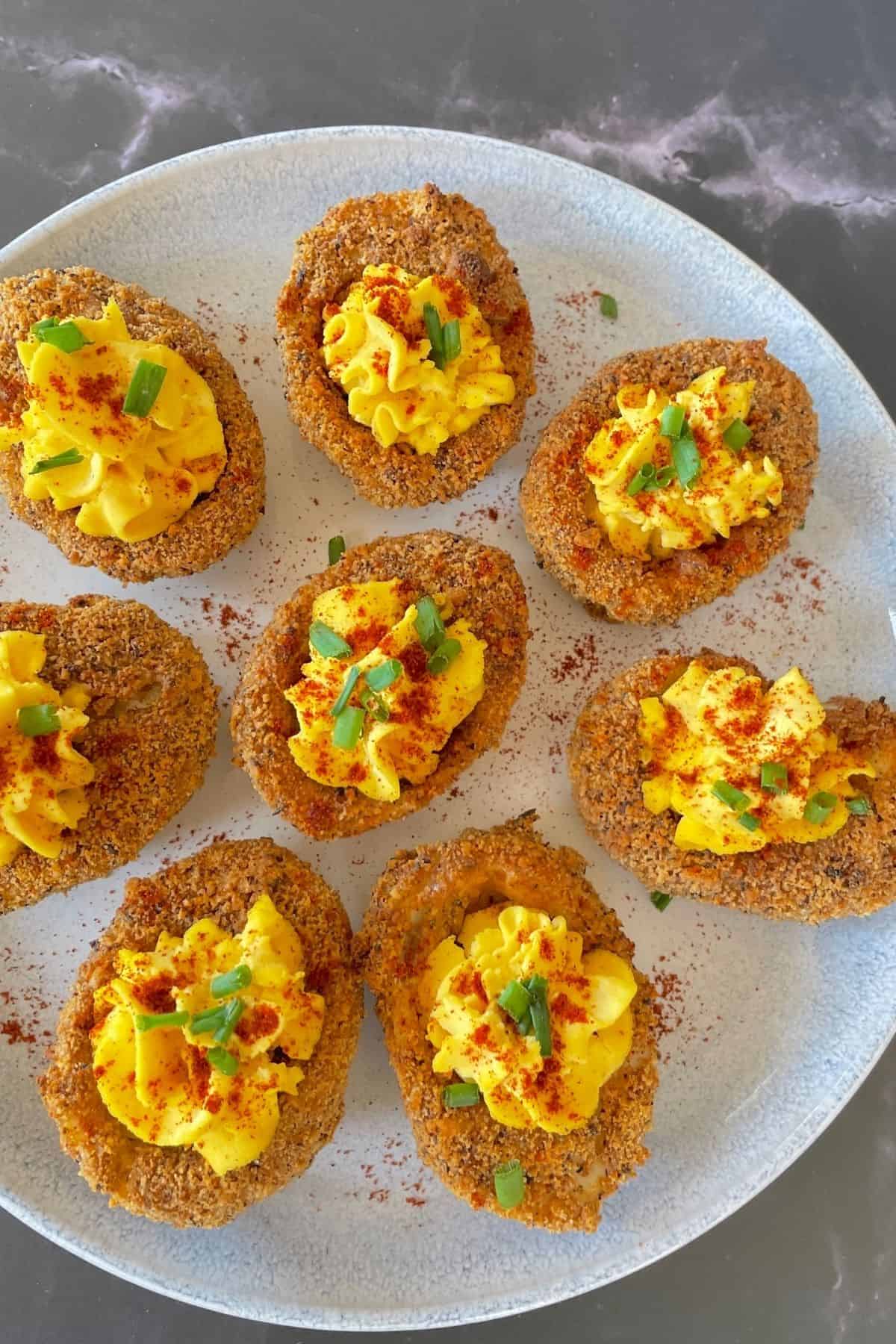 devilled eggs on a white plate