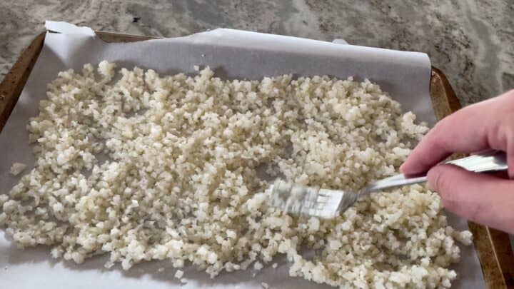 cauliflower rice on a baking sheet