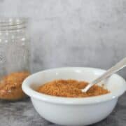 low carb breadcrumbs in a bowl next to mason jar