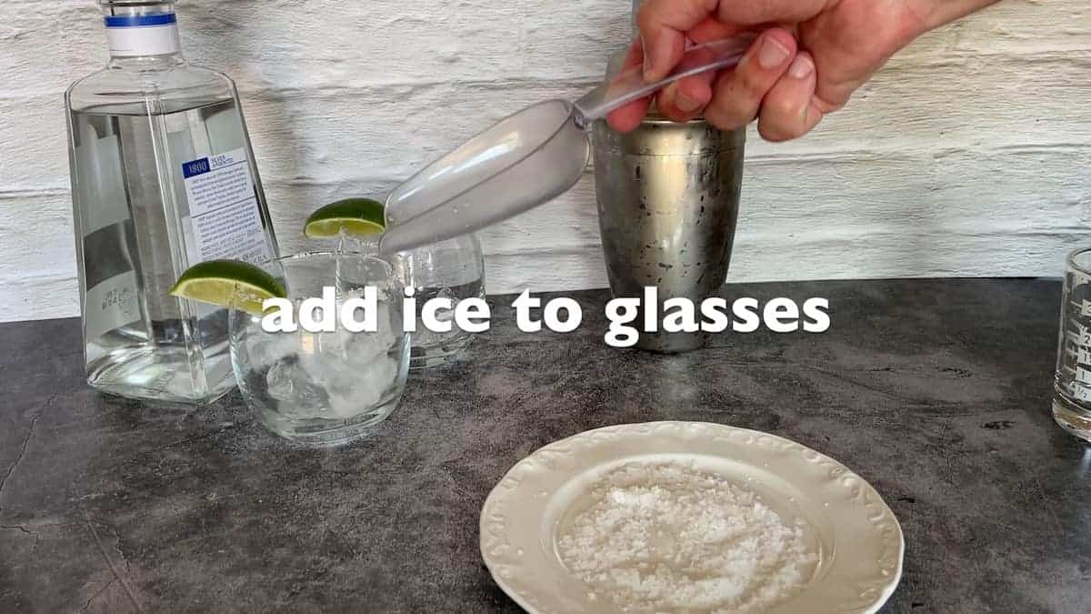 adding ice to glasses