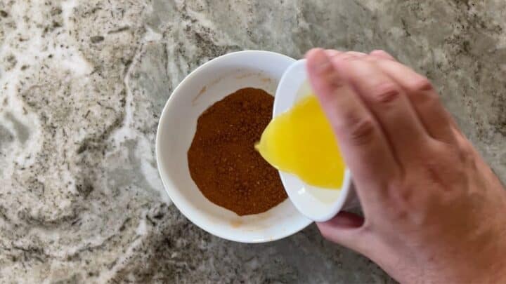 Mixing spice blend with butter