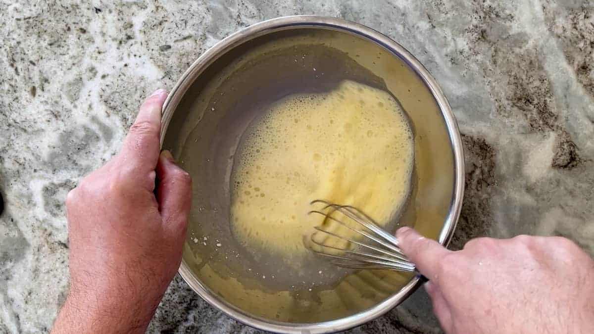 mixing the wet ingredients in a large bowl