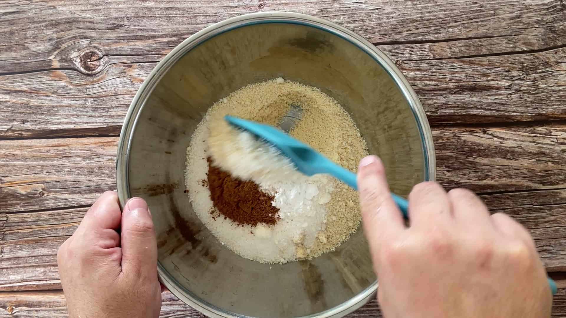 Mixing the dry ingredients in a large metal bowl