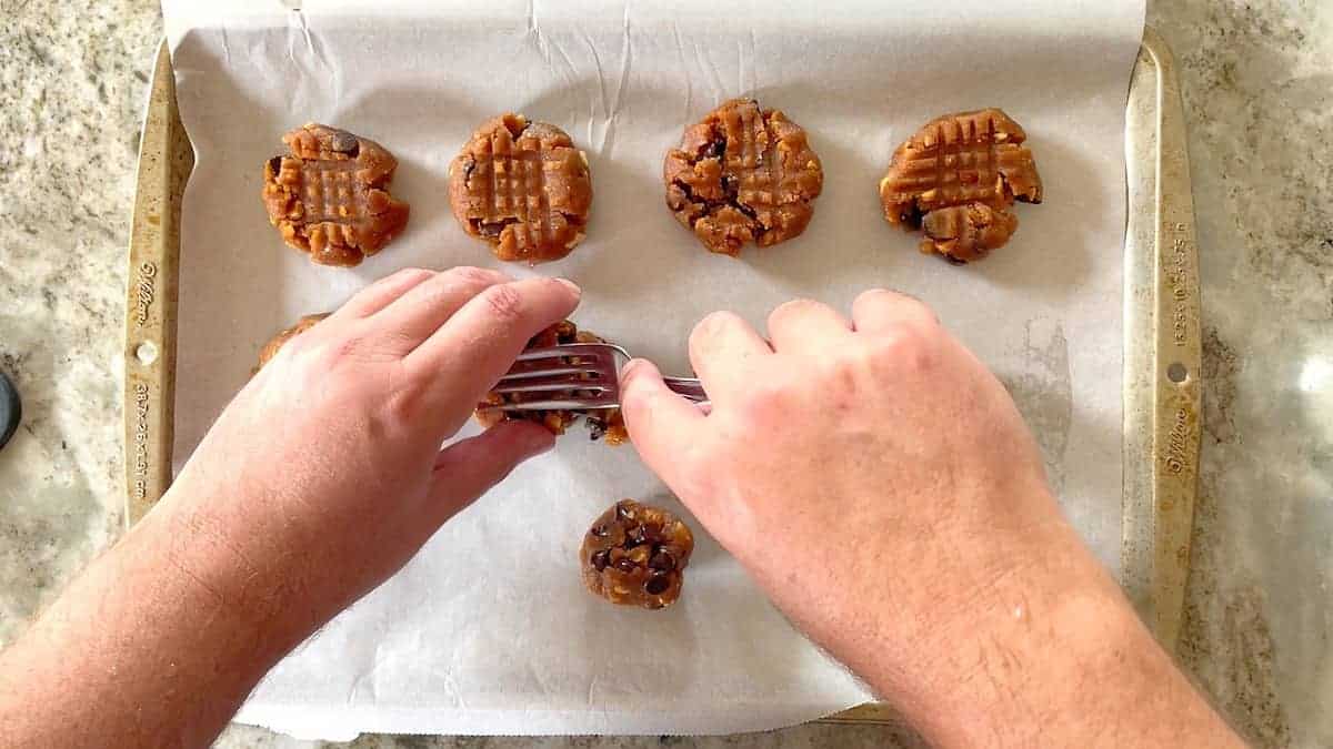 Pressing the dough with a fork