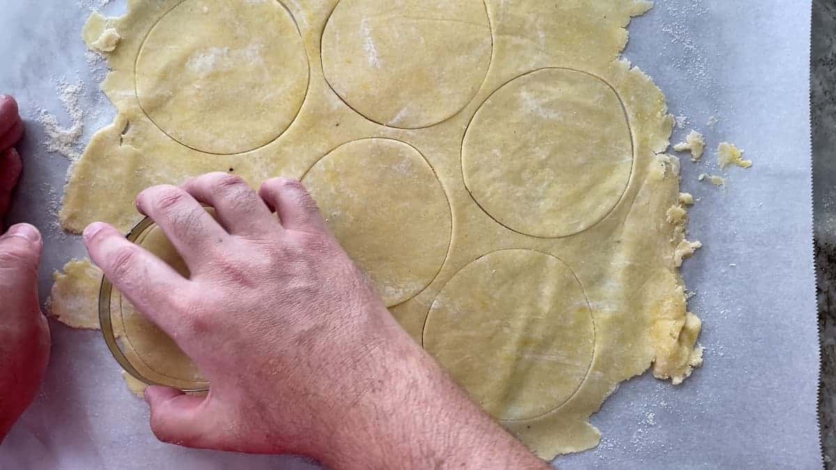 Cut dough with cookie cutter