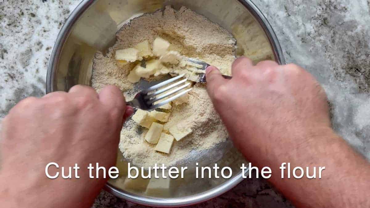 Cutting butter into pastry with 2 forks