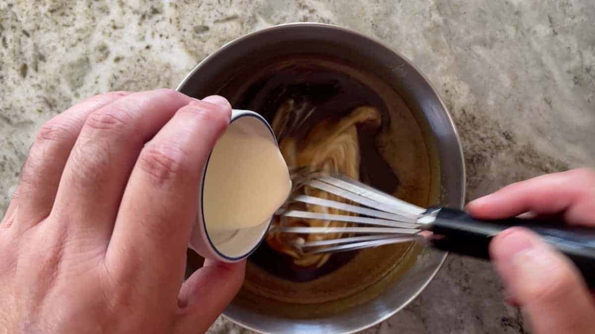 adding heavy cream to the filling while whisking