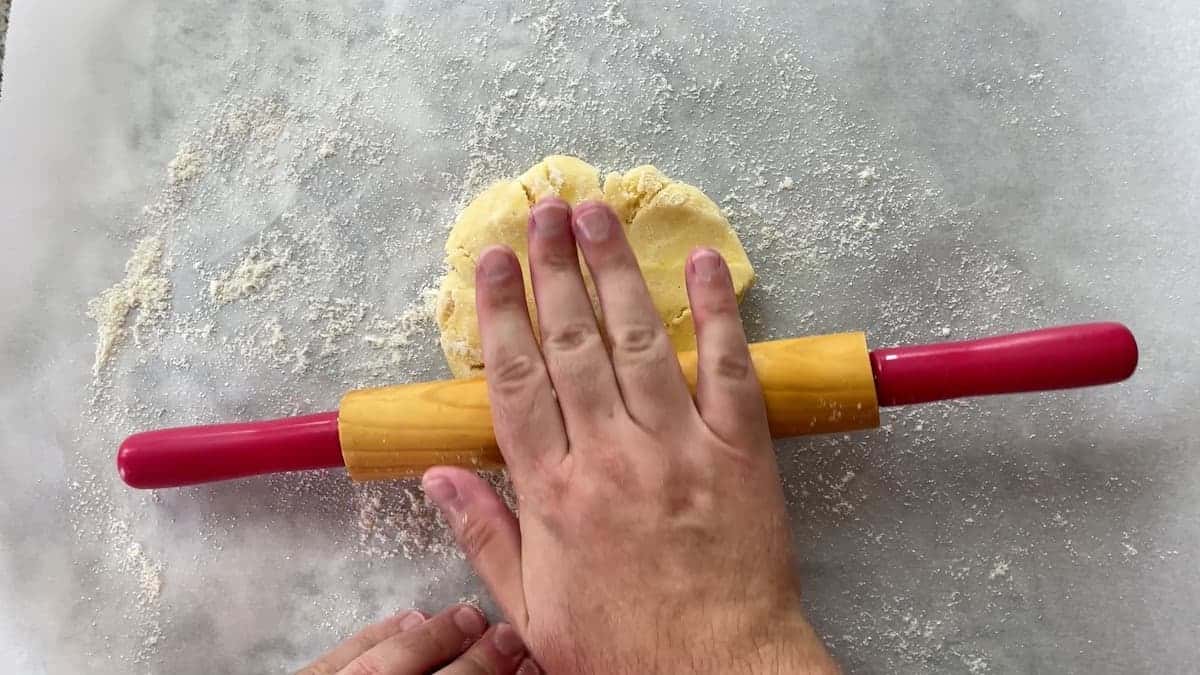 Rolling the dough with a rolling pin