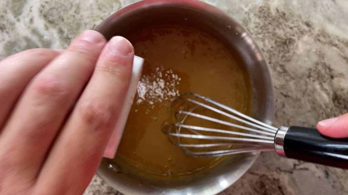 whisking in the xanthan gum in the saucepan