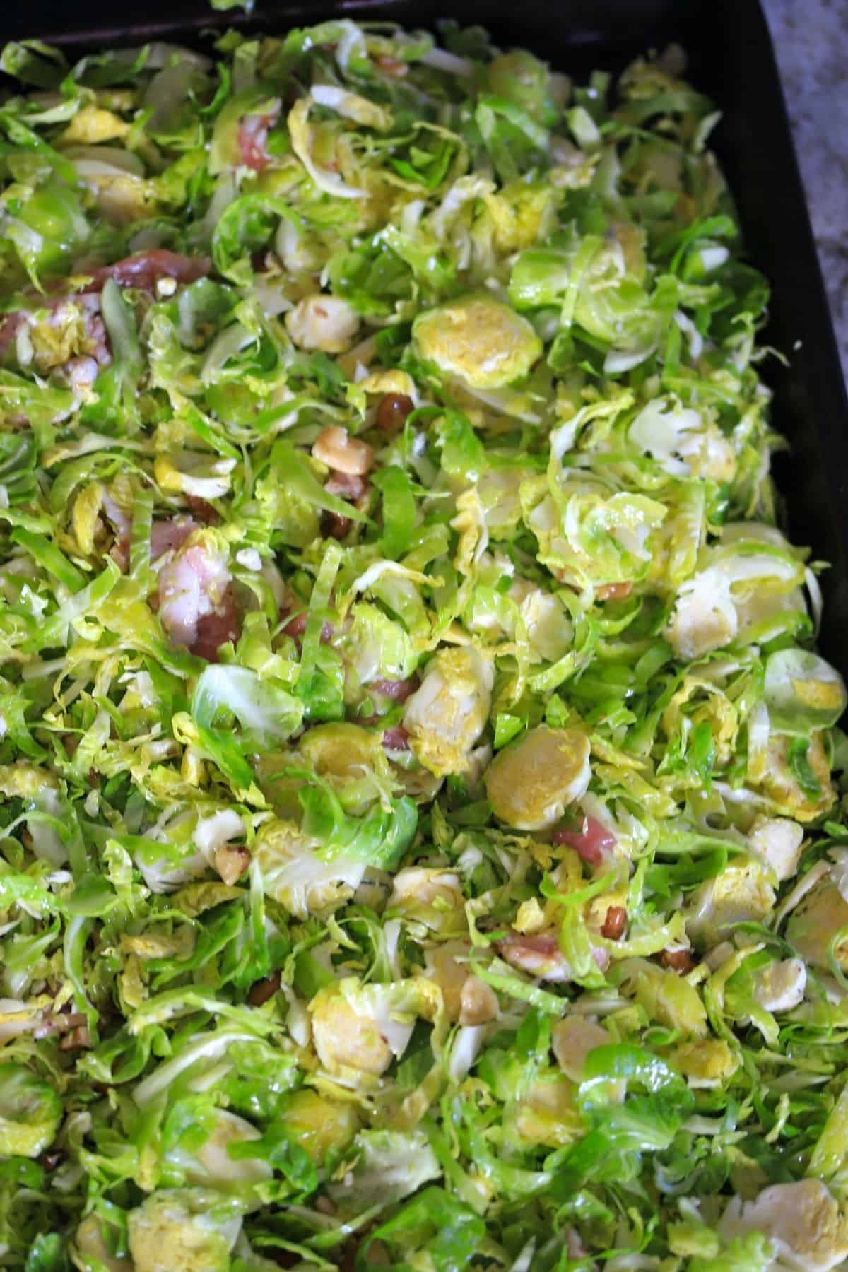 shaved brussel sprouts on a baking sheet