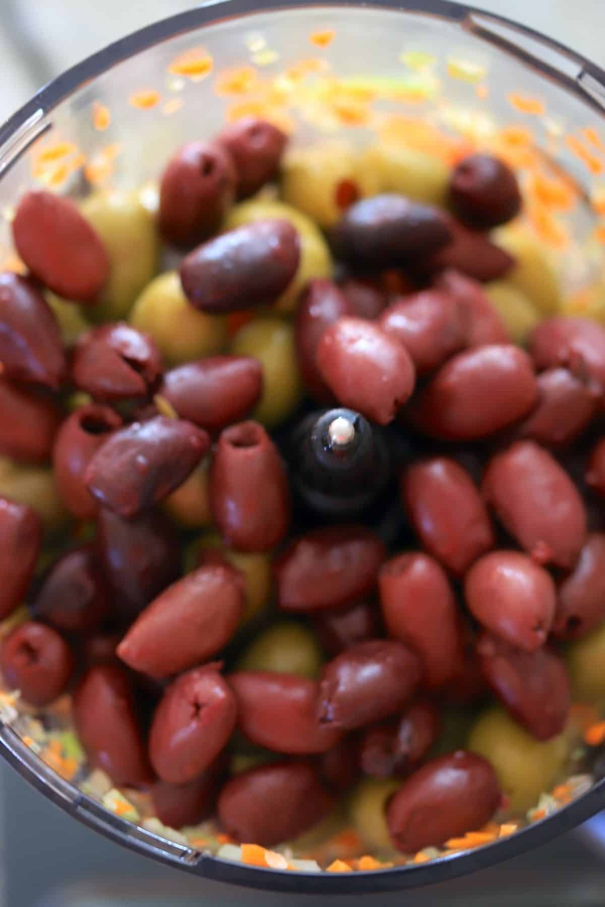 food processor with green and black olives