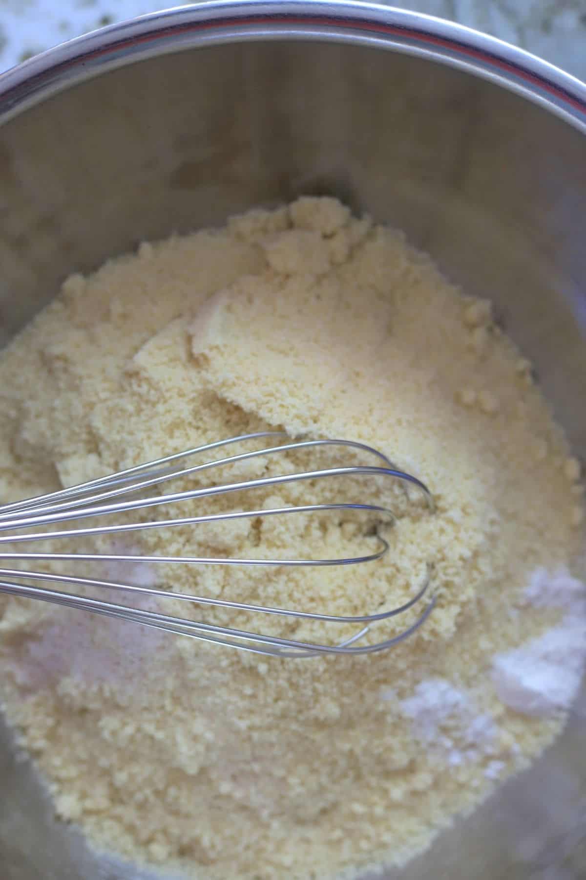 bowl with almond flour and a whisk