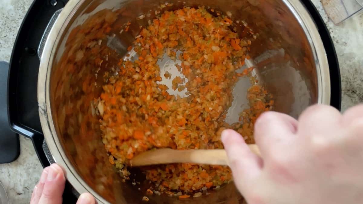 stirring the mirepoix in the instant pot