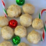 keto crunch shortbread cookies on a white plate with candy cane and bells