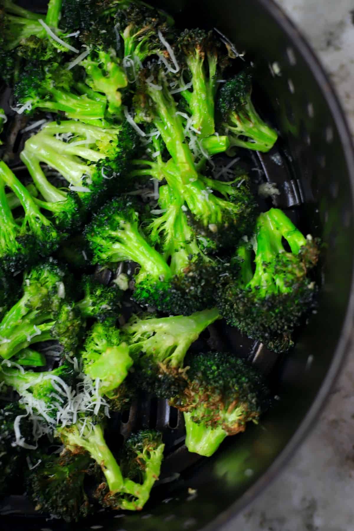 broccoli in the air fryer basket,