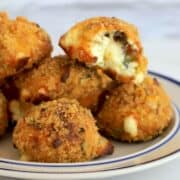close up of keto air fryer jalapeno popper bites on a plate.