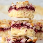 3 low carb blackberry coconut bars stacked.