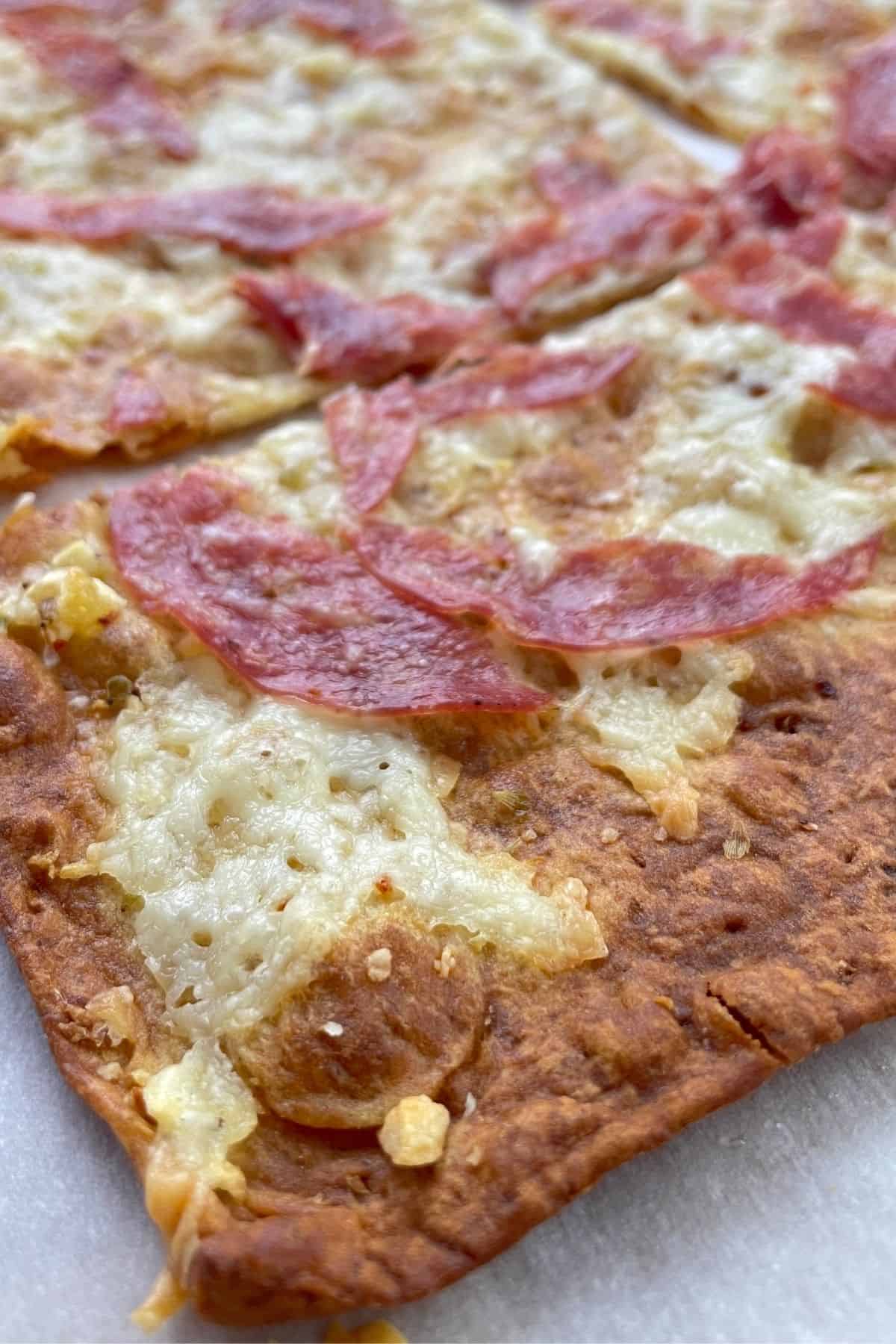 closeup of low carb lavash bread pizza.