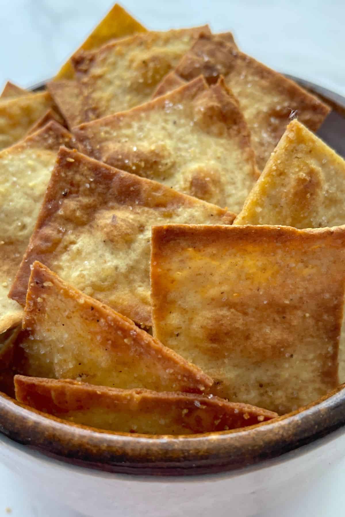 Crunchy low carb lavash crackers in a bowl.