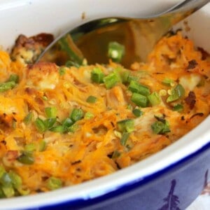 buffalo chicken spaghetti squash casserole with a spoon.