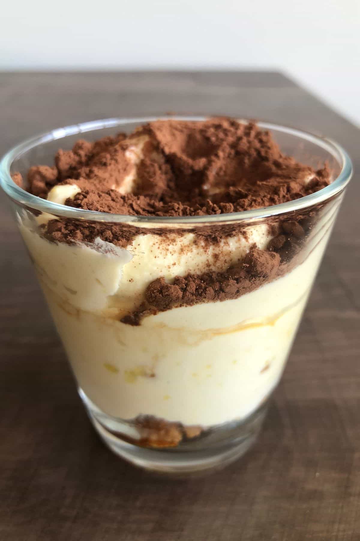 side view of a tiramisu cup.