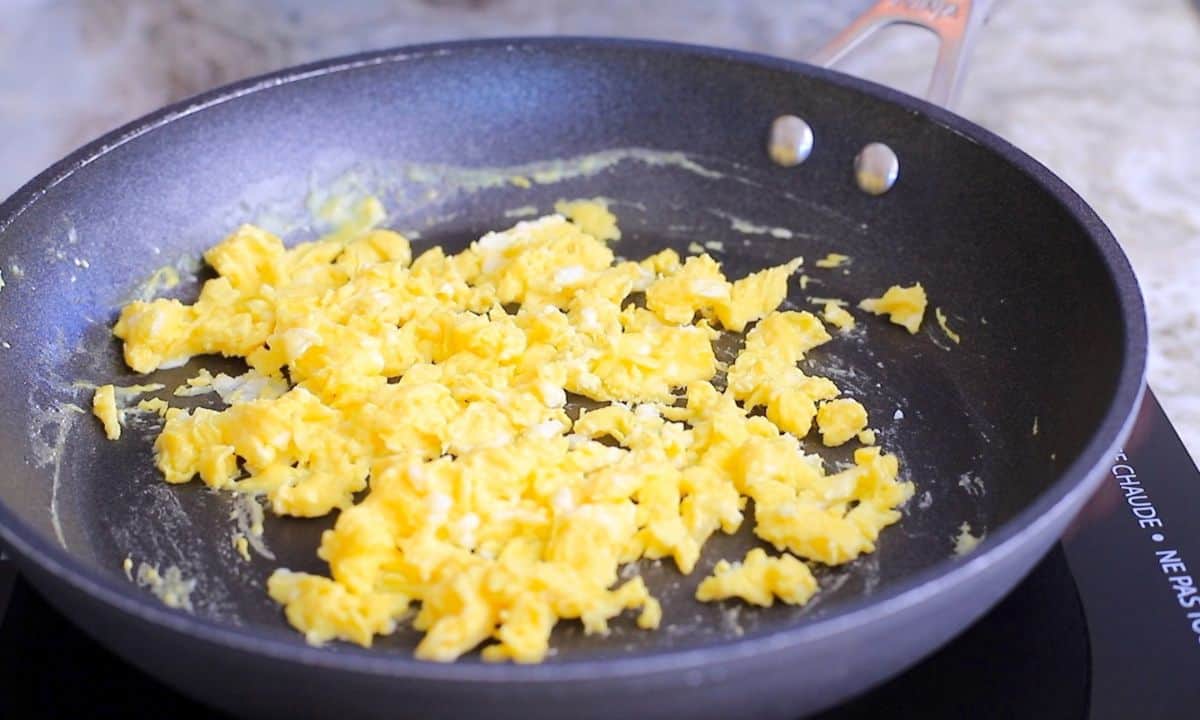 scrambled eggs in a skillet.