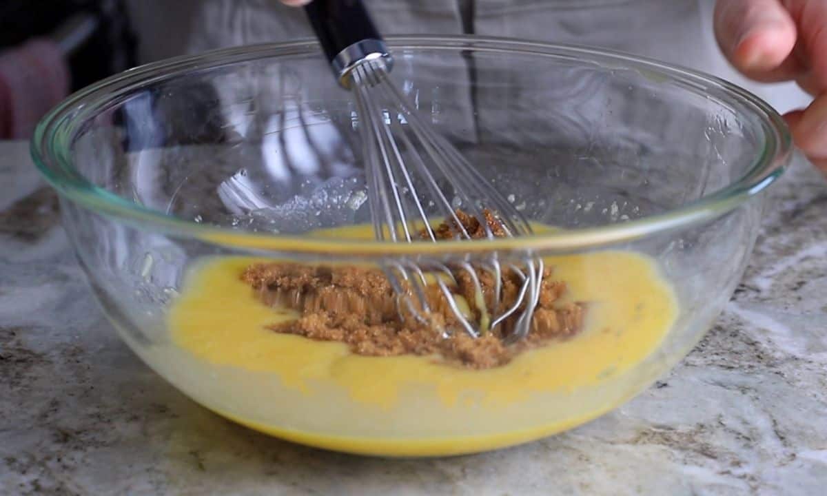 mixing brown sweetener into the egg mixture and brown butter.