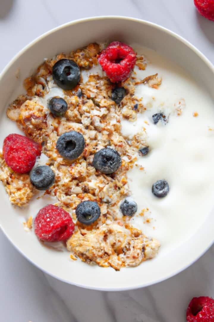 greek yogurt bowl with berries and granola.