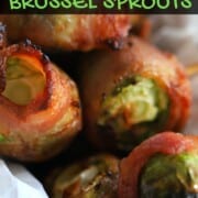 brussel sprouts wrapped in bacon with a toothpick inserted.