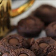 double chocolate fudge cookies with a gold coffee mug.