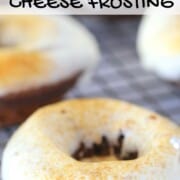 Keto Gingerbread Donuts with Cream Cheese Icing on a cooling rack.