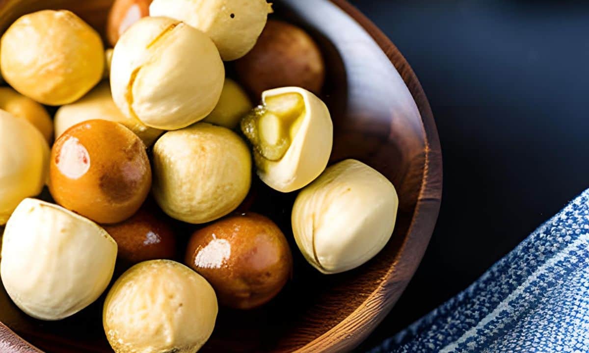 macadamia nuts in a brown bowl.