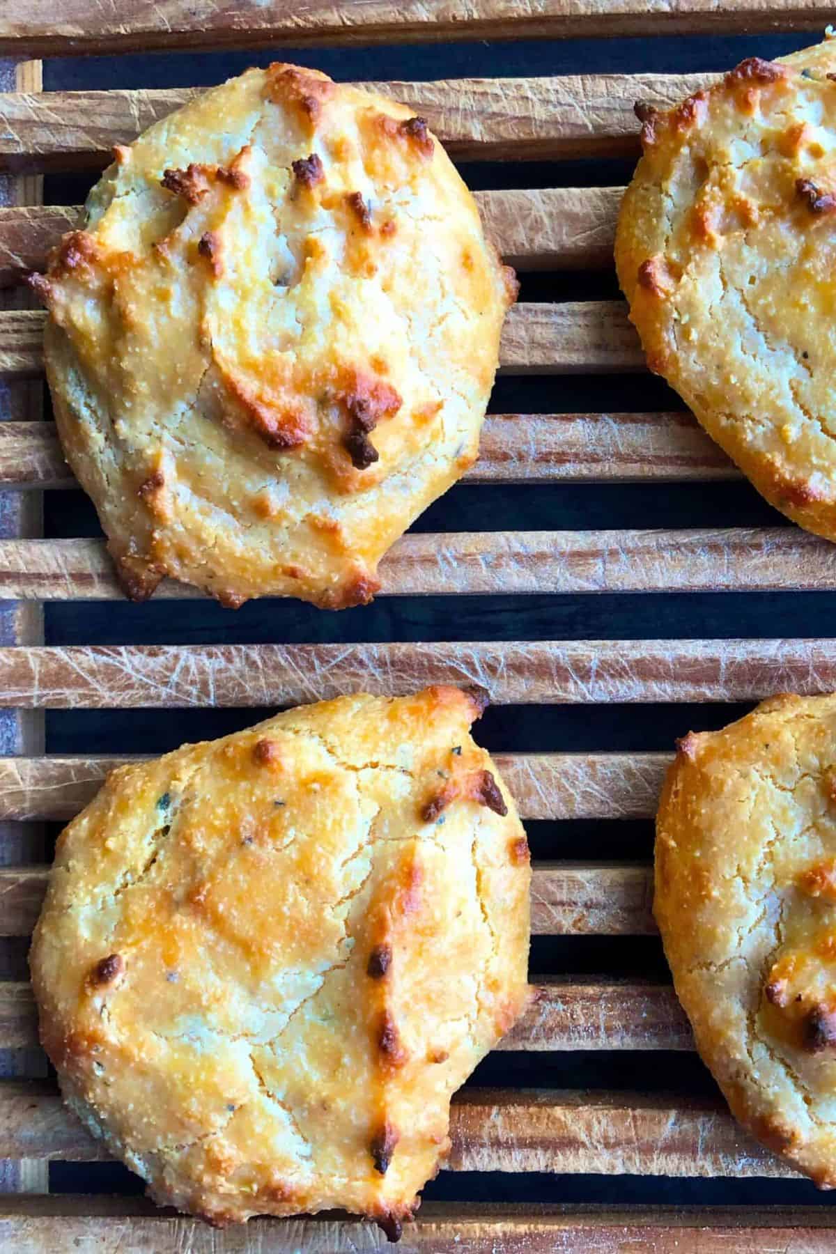 Sugar free biscuits on a bread cutting board.