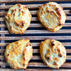 Sugar free biscuits on a bread cutting board.