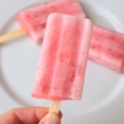 holding a sugar free popsicle.