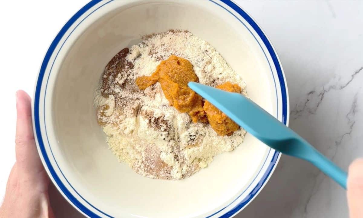 Mixing the ingredients in a large bowl.