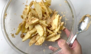 Apples with filling in a large glass bowl.