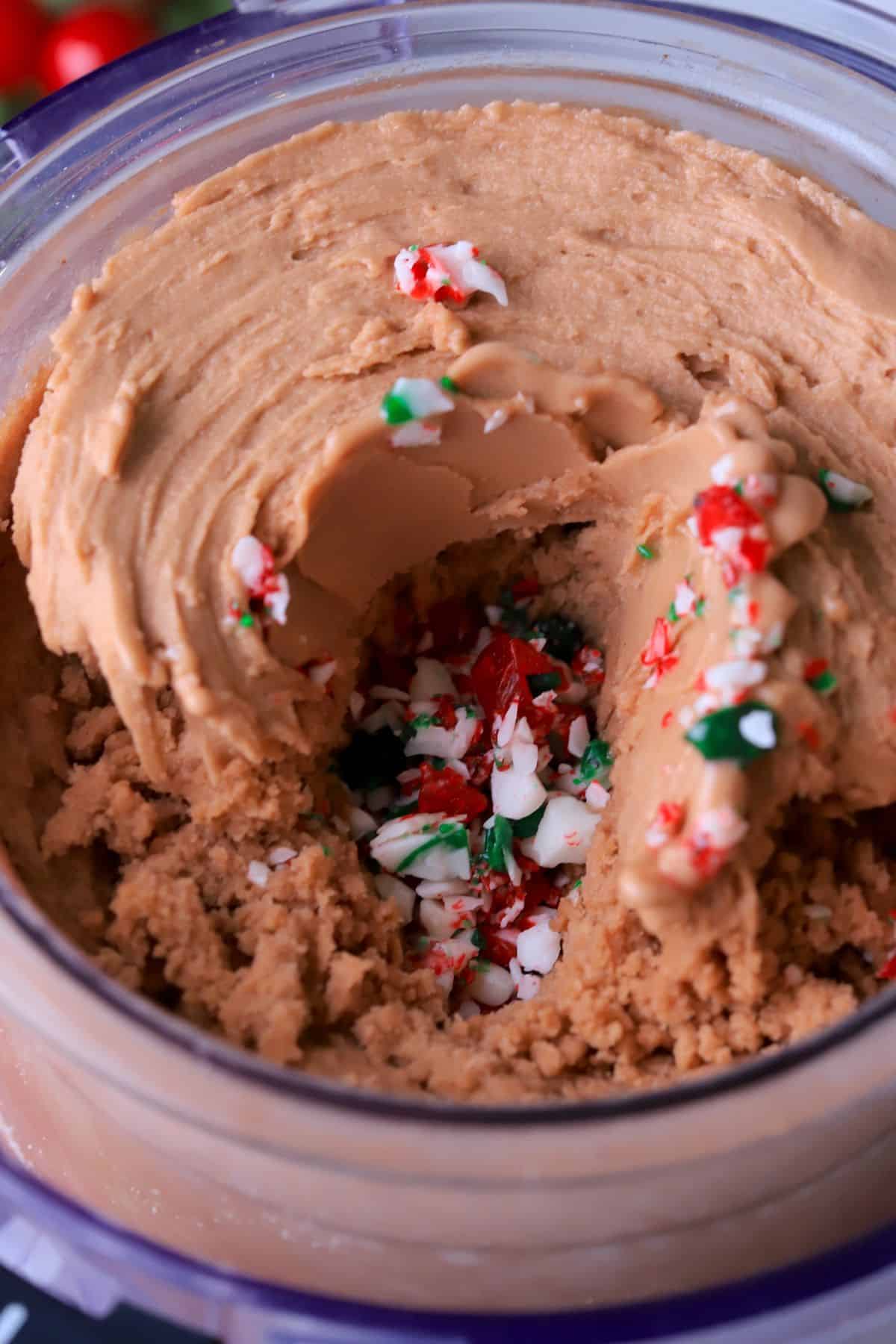 Ice cream in the pint with a well in the middle filled with crushed candy cane.