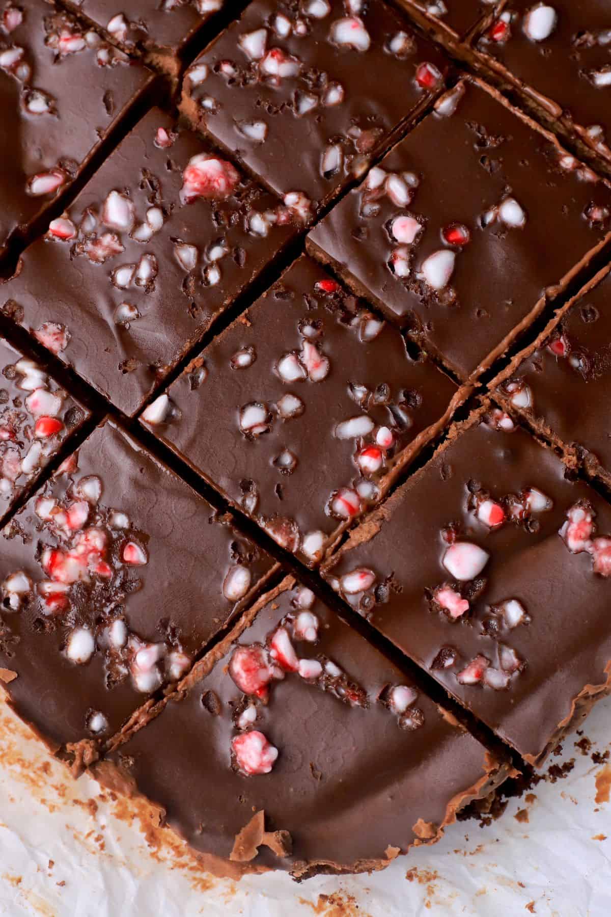 Flatlay photo of the sugar free peppermint mocha cheesecake cut into squares.