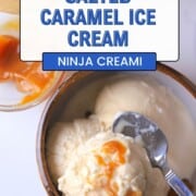 Overhead shot of Sugar free salted caramel ice cream in a bowl next to a small bowl of caramel sauce.