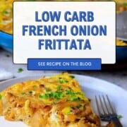 A slice of low carb french onion frittata on a plate next to the skillet.