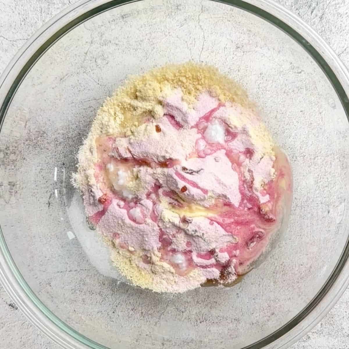 Mixture of ingredients in a large glass bowl.
