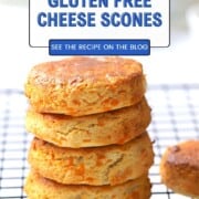 Four air fryer scones stacked on a wire rack.