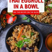 Low carb thai eggroll in a bowl in a large bowl next to a spoon, a cup and a pan with the same pinterest image.