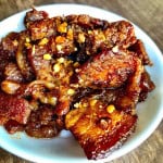 Sweet and spicy keto pork belly in a bowl.