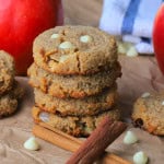 Stacked Low Carb Butterscotch Apple Cinnamon Cookies next to an apple and cinnamon sticks.