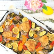 Sheet pan Chicken and Veggies with a white background.